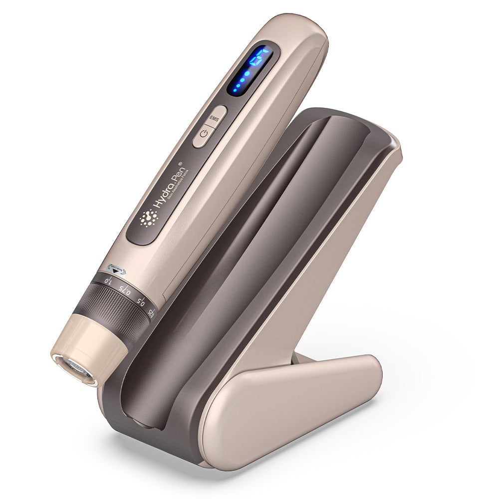 جهاز ⁦Hydra Pen H5⁩ باللون الذهبي الشامباني مع الخرطوشة والغطاء الواقي والقاعدة المطابقة